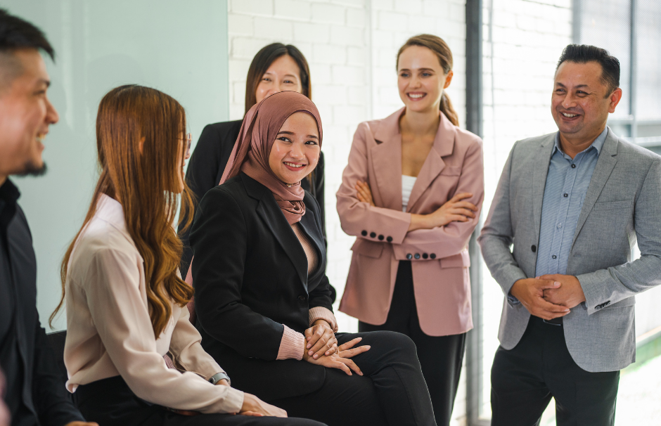 Hireloft Recruitment Agency Office team talking and laughing.