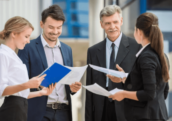 Hire loft Office team talking and laughing.