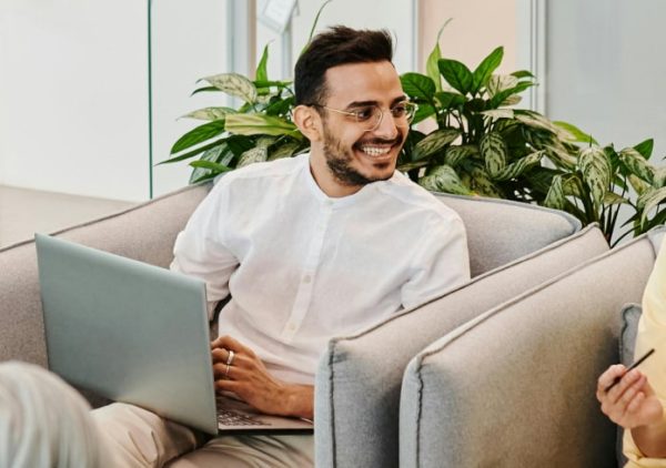 young-business-man-working-on-laptop-at-office