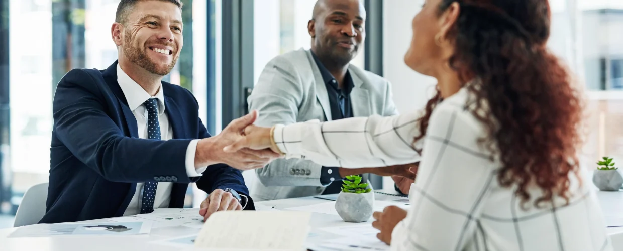 Woman shaking hands with hireloft interviewer